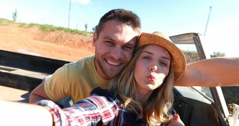 Cheerful Couple Taking Selfie on Sunny Road Trip Adventure - Download Free Stock Images Pikwizard.com