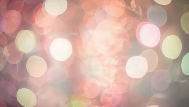 Glowing pastel bokeh with hexagonal highlights and dreamy soft wash