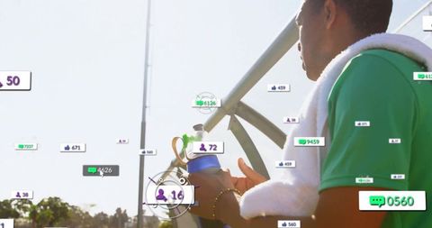 Athlete holding water bottle in stadium with digital interaction icons