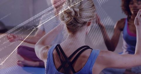Woman Practicing Yoga with Digital Overlay in Studio