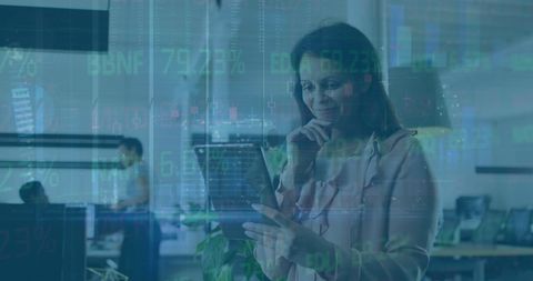Businesswoman Using Tablet with Digital Statistics Overlay - Download Free Stock Images Pikwizard.com