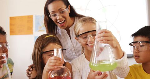 Diverse School Children Conducting Science Experiment in Classroom - Download Free Stock Images Pikwizard.com