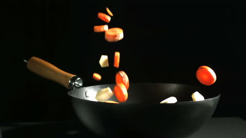 Colorful Salad Ingredients Tossing in Wok in Slow Motion