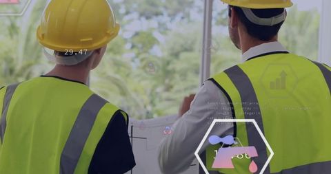 Engineers reviewing blueprints with augmented reality overlay through glass during site inspection