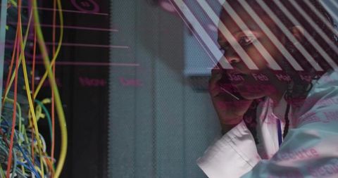 Holding Phone Examining Server Rack, Technician Analyzing Network Data Overlay in Data Center