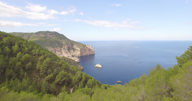 Transparent Clear View of Mountain by Sea under Blue Sky - Download Free Stock Videos Pikwizard.com