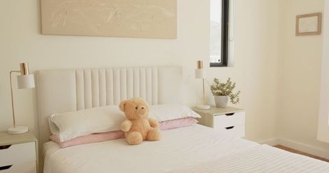 Minimalist Bedroom with Teddy Bear and Elegant Decor