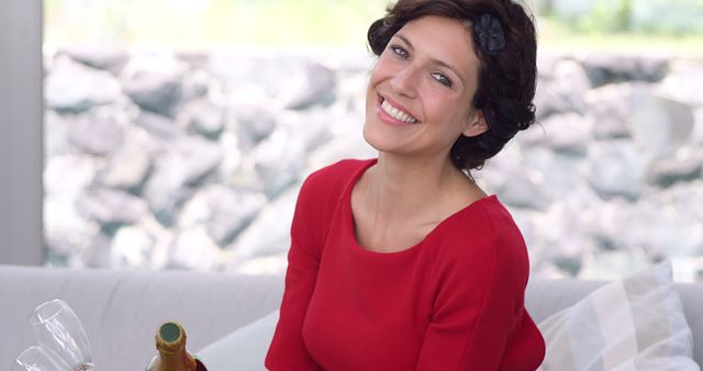 Smiling Woman Enjoying Champagne Celebration Indoors - Download Free Stock Images Pikwizard.com