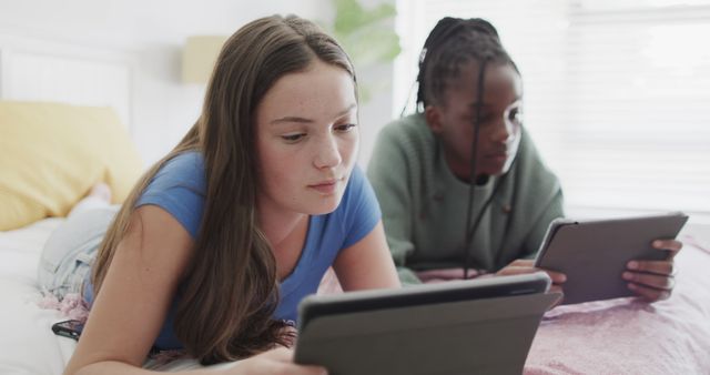 Teenage Girls Using Tablets in Bedroom - Download Free Stock Images Pikwizard.com