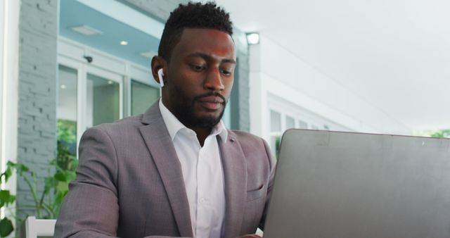 Focused Businessman Working on Laptop - Download Free Stock Images Pikwizard.com