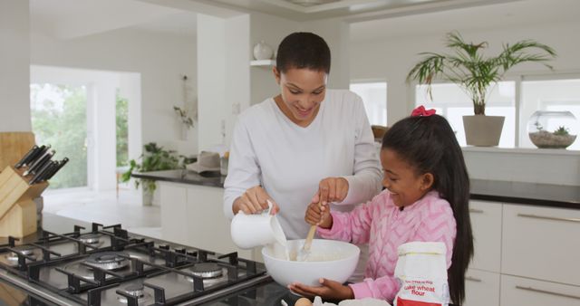 African American Mother and Daughter Baking Together in Modern Kitchen - Download Free Stock Images Pikwizard.com
