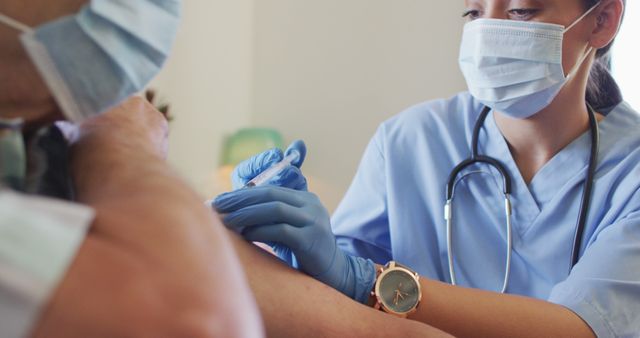 Nurse giving vaccine shot to patient in a clinical setting. For use in healthcare, vaccination campaigns, public health announcements, and clinical training materials.