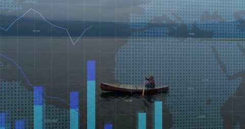 Paddling man in red canoe on calm lake with overlaid data charts and world map grid