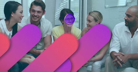 Diverse team engaging in creative discussion at modern workplace