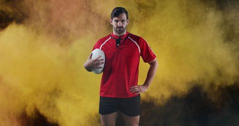 Rugby Player in Red Jersey Holding Ball