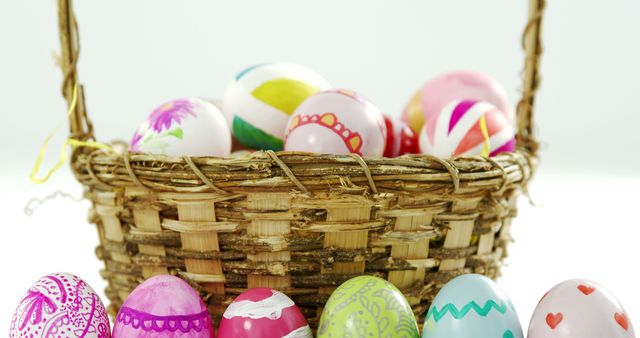A collection of vibrant and hand-painted Easter eggs displayed in a rustic wicker basket. Perfect for themes related to Easter celebrations, holiday decoration ideas, springtime festivities, and traditional holiday artwork.