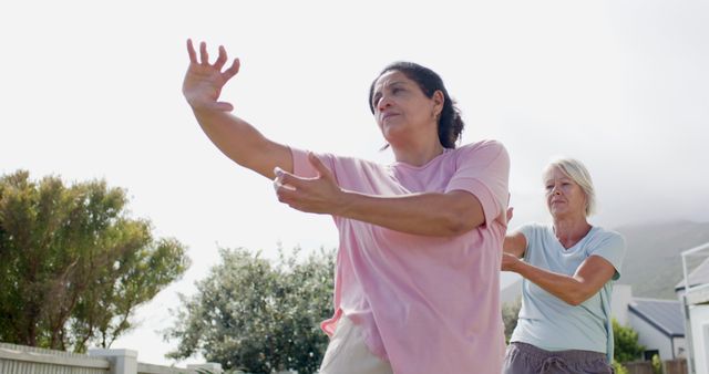 Senior Women Practicing Tai Chi Outdoors - Download Free Stock Images Pikwizard.com