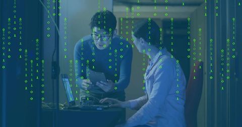 Technicians in Data Center Collaborating on Cybersecurity