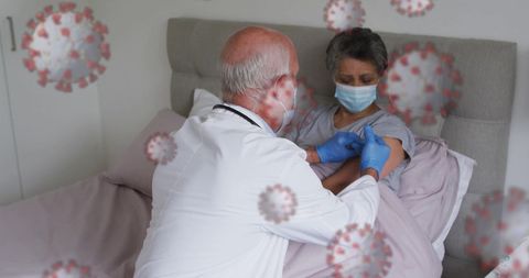 Doctor Administering Vaccine to Patient Against Virus Cells