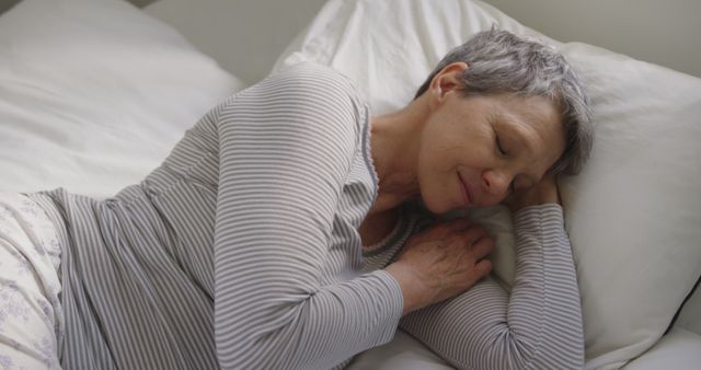 Peaceful Sleep: Elderly Woman Resting Comfortably in Cozy Bedroom - Download Free Stock Images Pikwizard.com