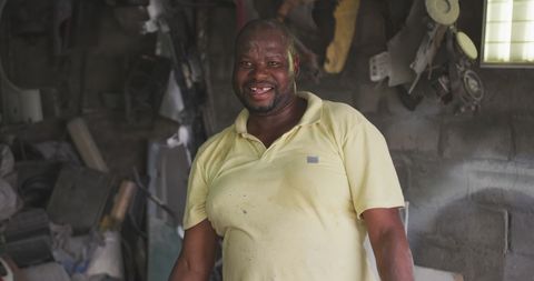 Smiling Handyman in Workshop Bringing Optimism to Repair Work - Download Free Stock Images Pikwizard.com