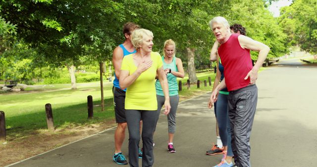 Seniors are engaging in fitness activities, showing the importance of staying active during aging. Good for content promoting elderly wellness, fitness programs for older adults, and outdoor health activities.