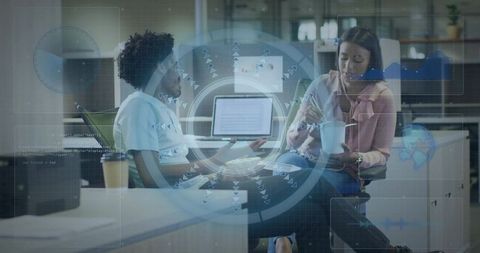 Coworkers collaborating over tablet and phone in modern office with digital hud overlay