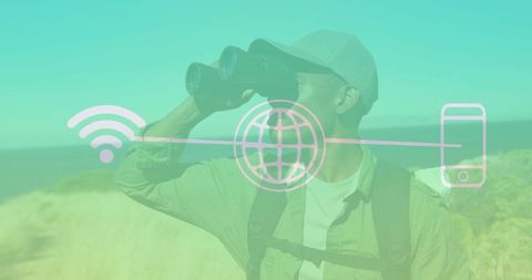 Man with Binoculars on Coastal Dune Adventuring into Ocean Horizon