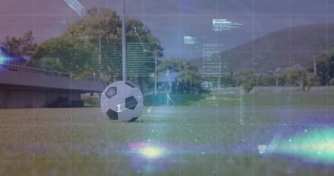 Futuristic Soccer Ball with Digital Hologram on Sports Field