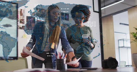 Diverse Team Analyzing Global Financial Data with Digital Interface