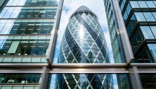 Gherkin tower framed by modern glass facades, diamond-pattern glazing, dynamic perspective