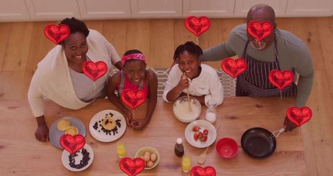 Joyful Family Breakfast with Heart Balloons Celebrating Love