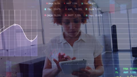 Businesswoman Analyzing Digital Financial Data on Tablet