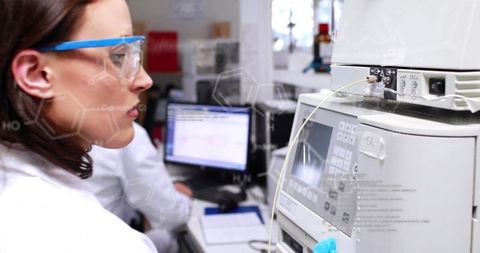 Caucasian Female Scientist Analyzing Data in High-Tech Laboratory - Download Free Stock Images Pikwizard.com