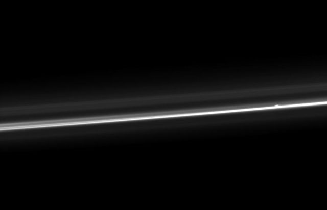NASA Cassini spacecraft captures Saturn ever-changing F ring, showing its bright core, another strand of ring material, and a breakaway clump of material close to the core.