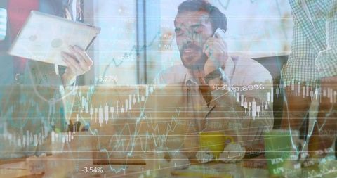 business professionals analyzing market trends in modern office - Download Free Stock Images Pikwizard.com