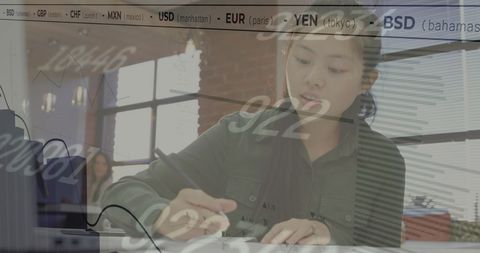 Businesswoman Analyzing Stock Market Trends with Data Overlay