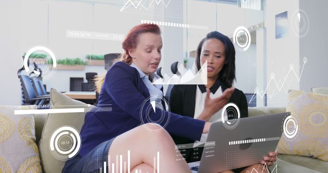 Two Diverse Businesswomen Analyzing Digital Data on Laptop - Download Free Stock Images Pikwizard.com