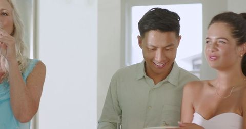 Guests Laughing and Socializing at Wedding Celebration