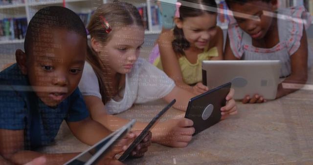 Children Learning with Tablets in Library Expanding Digital Future