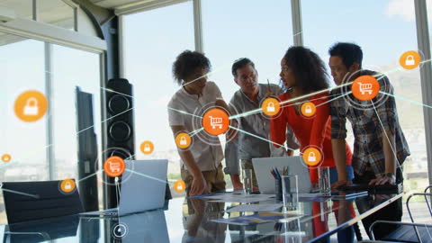 Diverse Team Collaborating on Digital Network Project in Modern Office