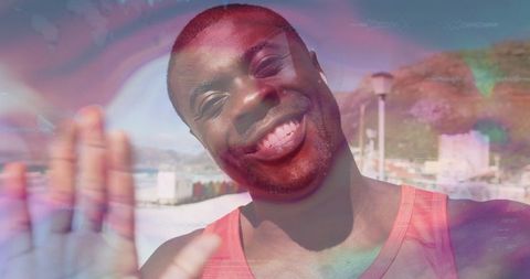 Joyful Man Waving Near City Waterfront