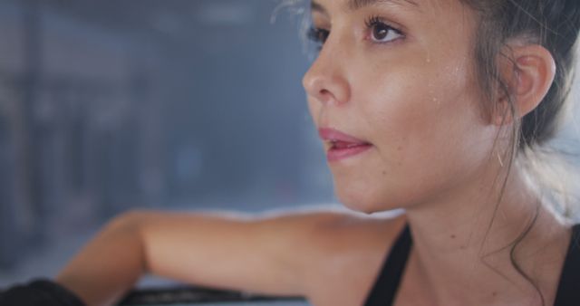 Focused Young Woman Resting After Workout in Gym - Download Free Stock Images Pikwizard.com