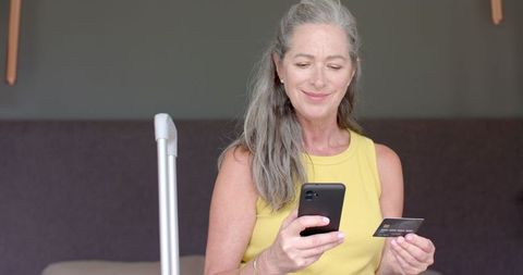 Mature Woman Using Credit Card for Smartphone Purchase - Download Free Stock Images Pikwizard.com