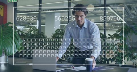 Businessman using laptop with augmented reality hud overlay office analyzing documents holding to-go