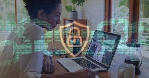Businesswoman Ensuring Data Security on Laptop with Digital Overlay - Download Free Stock Images Pikwizard.com