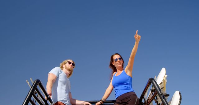 Happy Couple Enjoying Vacation on Boat Under Clear Blue Sky - Download Free Stock Images Pikwizard.com