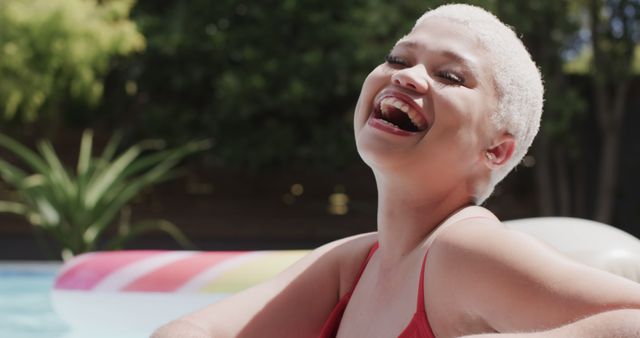 Laughing Woman Enjoying Summer by the Pool - Download Free Stock Images Pikwizard.com