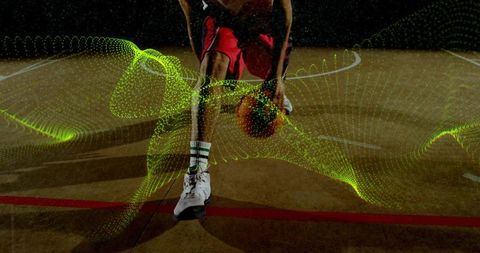Basketball Player Dribbling on Court with Futuristic Green Digital Waves