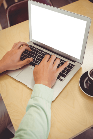 person typing on transparent laptop in coffee shop setting - Download Free Stock Videos Pikwizard.com